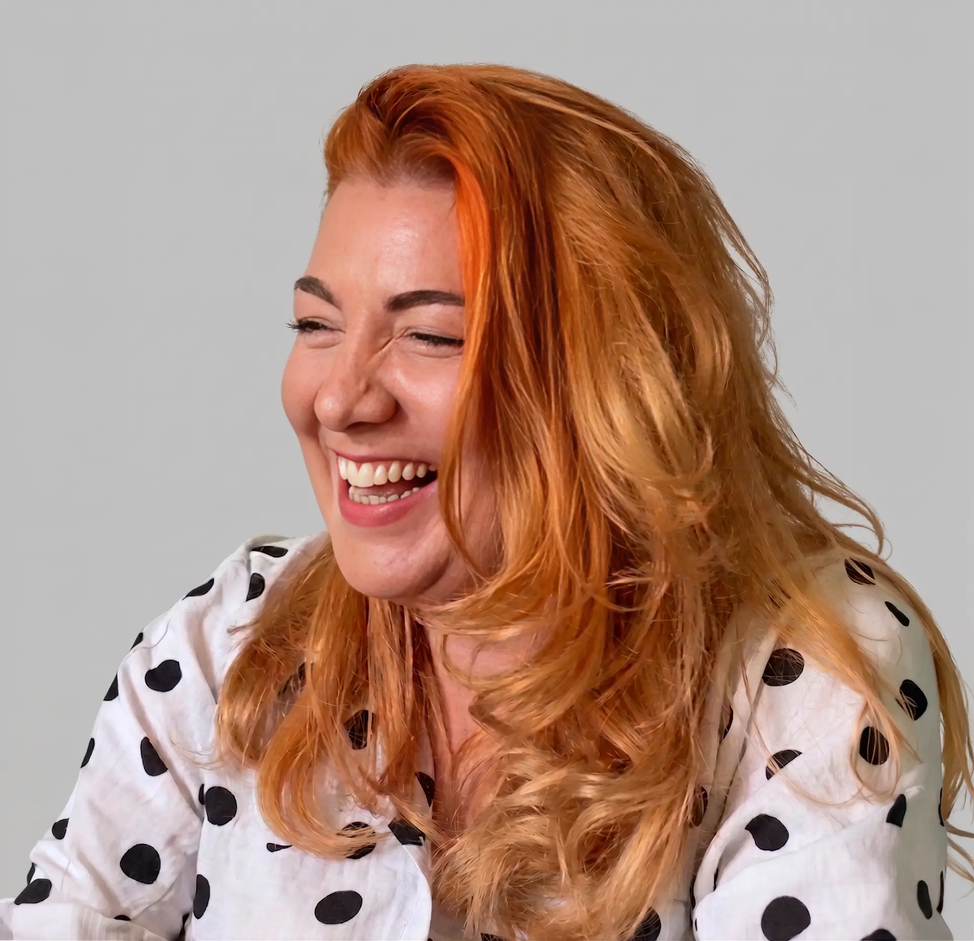 Sarah Hogan, founder of Happy Hour Studio, laughing